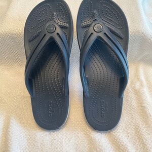 Blue Crocs flip flops